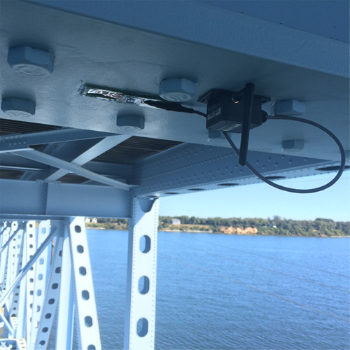 Wireless strain (stress) gauge SenSpot sensor installed on a bridge girder